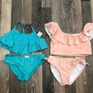 Girls bundled 2-piece swimsuits. Size M (7-8).